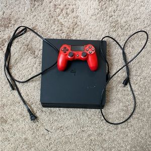 PS4 Slim Black 1 TB Space. Red Controller, HDMI and Power Cable Included.